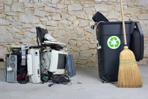 Professionals clearing a cluttered garage in Bermondsey