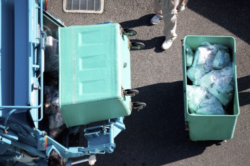 Workers sorting construction waste materials